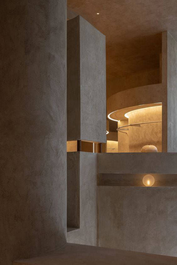 Warm-toned walls and illuminated niche detail