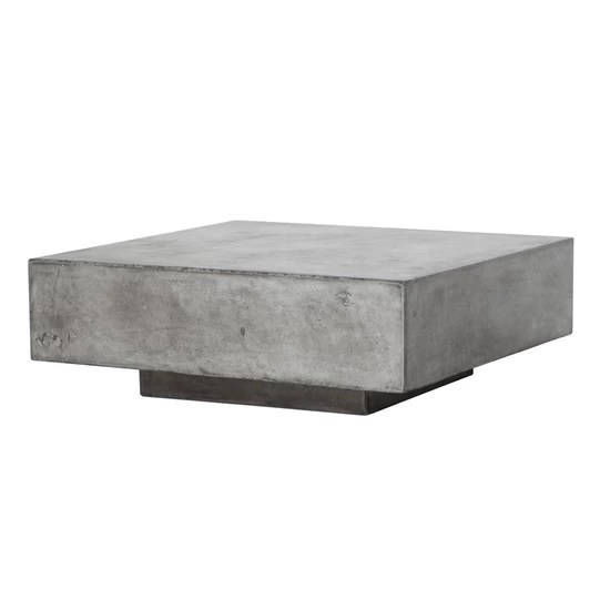 Square grey coffee table with a thick top and low plinth