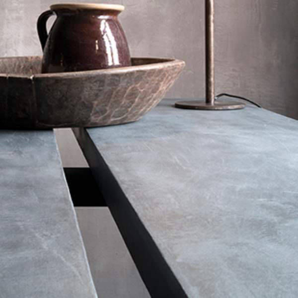 Grey worktop detail with a wooden bowl and jug