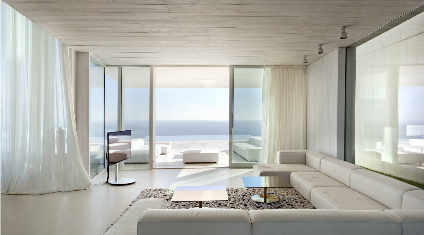 Cementare flooring connecting a living room and terrace